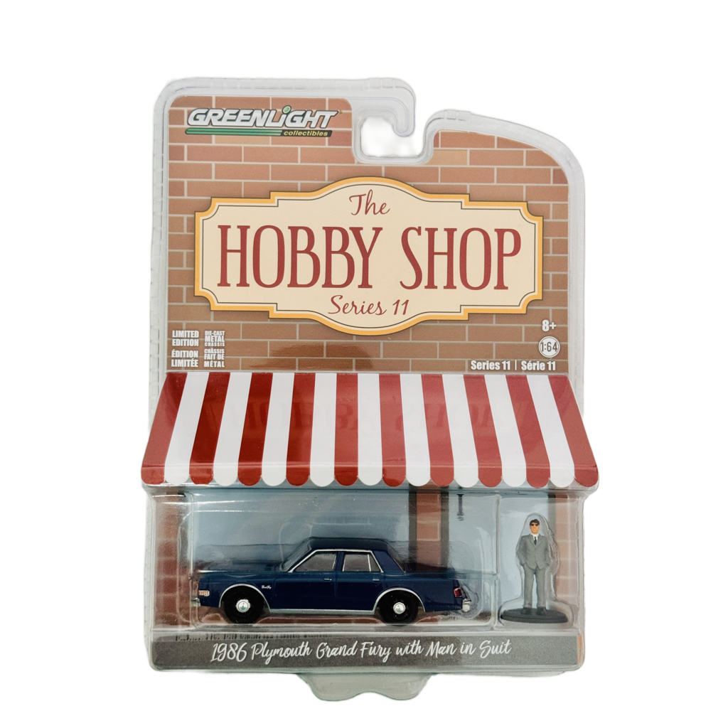 Greenlight The Hobby Shop 1986 Plymouth Grand Fury With Man In Suit